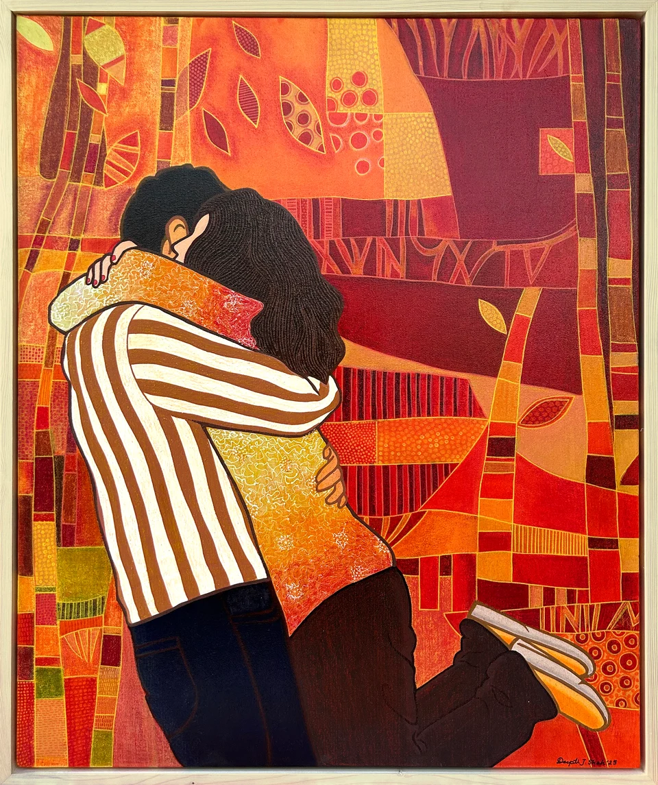 The Hug by Deepti J. Shah — Two figures embrace within a composition of orange, yellow and earthy patterns.