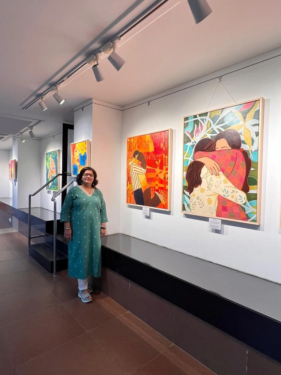 Deepti J. Shah with her contemporary paintings at Jehangir Art Gallery